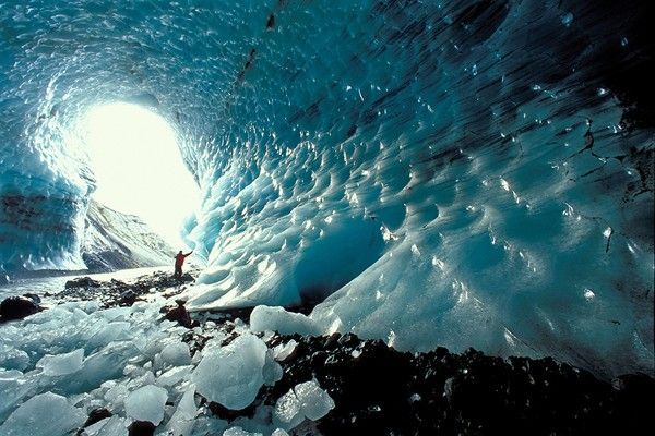 Man standing in an ice cave of the Kverkjoekull Glacier in the Kverkfjoell mountains, highlands, Iceland, Europe
