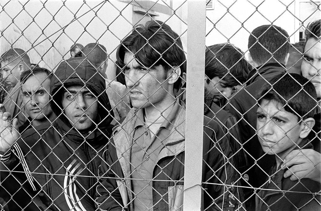 1024px 20101009 Arrested refugees immigrants in Fylakio detention center Thrace Evros Greece restored