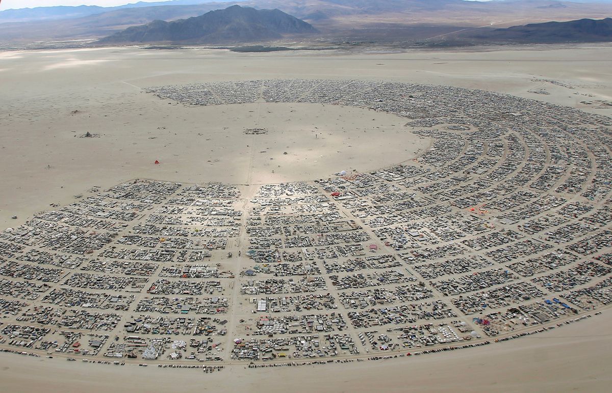 An aerial view as approximately 70,000 people from all over the world gather for the 30th annual Burning Man arts and music festival in the Black Rock Desert of Nevada, U.S. August 31, 2016. REUTERS/Jim Urquhart FOR USE WITH BURNING MAN RELATED REPORTING ONLY. FOR EDITORIAL USE ONLY. NOT FOR SALE FOR MARKETING OR ADVERTISING CAMPAIGNS. NO THIRD PARTY SALES. NOT FOR USE BY REUTERS THIRD PARTY DISTRIBUTORS. TPX IMAGES OF THE DAY. - RTX2NQTJ