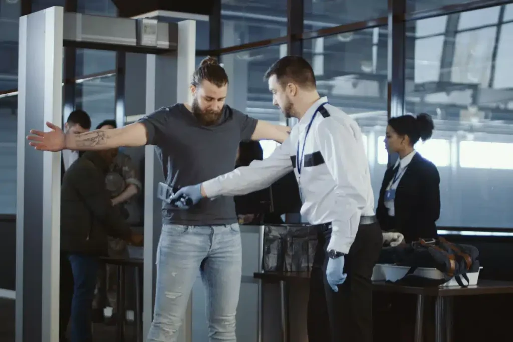 Aux Contrôles de Sécurité de l'Aéroport